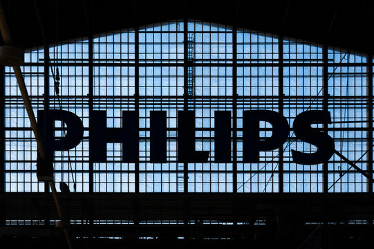 Hamburg, Germany - July 1, 2025: Silhouette of the sign of Philips company in the railway station of Hamburg. 