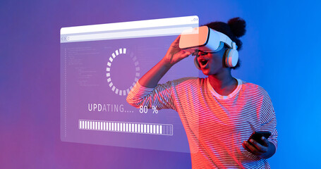 A young woman immersed in a virtual reality experience while her device updates. The vibrant...