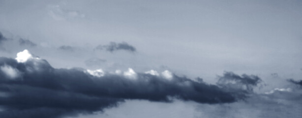 Obraz premium Stormy dark cloudy sky. Pollution, PM 2.5, Carbon dioxide and environment problems concept. Halloween, scary scene thunderstorm and rainy season backdrop.