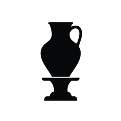 Black pottery jug on pedestal vase amphora