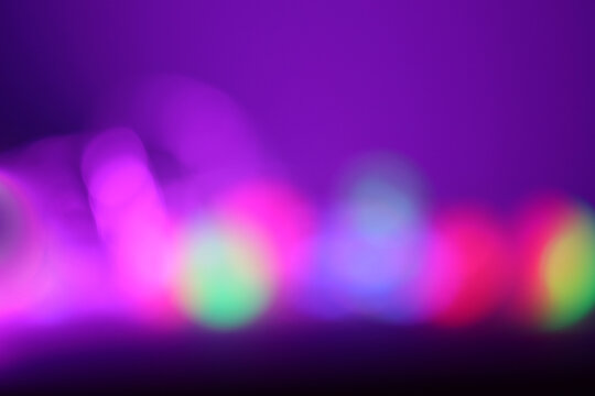 Smoke Abstract blur soft focus blinking light copy space background. Light and shadow rays refraction. Blue, violet.