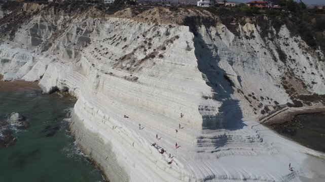 Sweeping Drone Flyover from Scala dei Turchi Cliffs to Sandy Beach below &ndash; Sicilian Coastal Beauty
