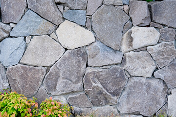 Obraz premium Old stone wall patterned texture or background