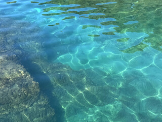 Emerald green clear clean sea.
