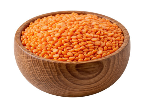 Red lentils in wooden bowl isolated
