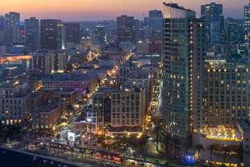 Rooftop view looking down over the Gaslamp district in San Diego at night