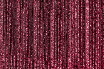 Obraz premium Texture of red jersey with lurex. Fragment of shiny striped fabric.