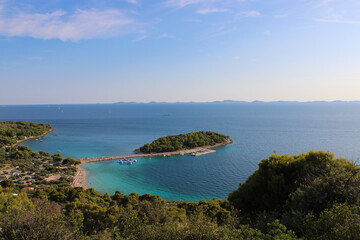 island plaža riva podvrške with ocean skyline from viewpoint veli vrh, Murter, Croatia