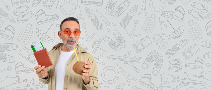A traveler holding a passport and a coconut drink is excited about upcoming vacations. With travel essentials in hand, he embodies the spirit of adventure and exploration during summer.