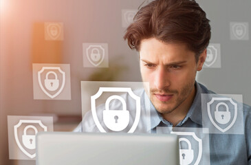 Business project, data protection and cybersecurity online. Focus on pensive busy young man in...