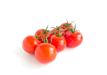 A branch of red tomatoes, Cocktail tomatoes isolated on a white background