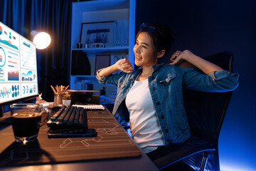Young beautiful Asian businesswoman taking break with stretching body with ache symptom for...
