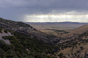 Fototapeta premium Storm Over Rugged Natural Terrains