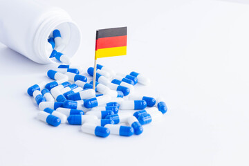 Tablets and the flag of Germany. Import of tablets to Germany.