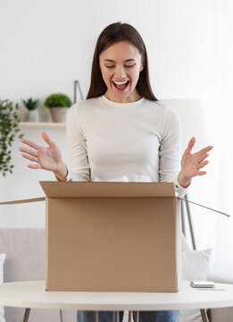 Woman screaming with joy received long-awaited package, fast easy and quick post mail parcel delivery, vertical panorama