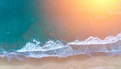 Fototapeta premium Aerial View of Turquoise Ocean with Sandy Beach and Sunlight at the Coast
