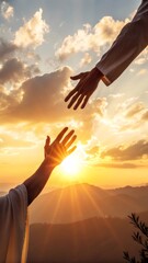 Two hands reaching for each other against a beautiful sunset sky, symbolizing help, salvation, and hope