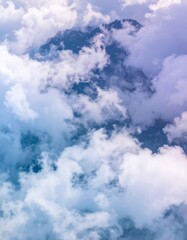 Obraz premium Overhead View of Soft White Cumulus Clouds Against a Blue Sky Backdrop