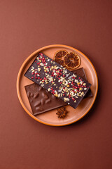 Bar sweet craft artisan chocolate with dried fruits made at home. Craft chocolate