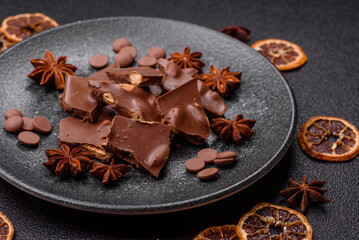 Bar sweet craft artisan chocolate with dried fruits made at home. Craft chocolate