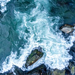 Aerial View of Rushing River Rapids Flowing Over Rocks with Turquoise Water