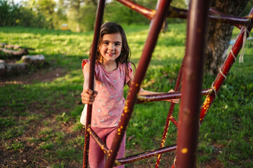 Playing joyfully in a sunny park on a warm spring afternoon