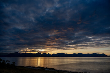 Dramatic Sunset/Sunrise Over Lake & Mountain Silhouettes: Golden Hour Reflections on Water with...