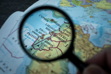 Tel Aviv, vibrant coastal city in Israel, seen through a magnifying glass highlighting its culture,...