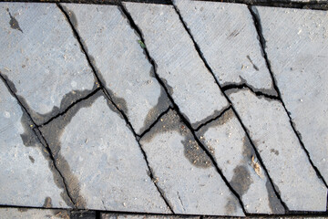 Broken floor slab. Close-up background.