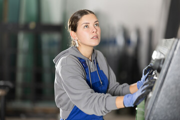 During production cycle, girl worker changes initial data to control board, controls mechanisms by...
