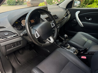 The modern car interior boasts a sleek design that not only looks appealing but also features...