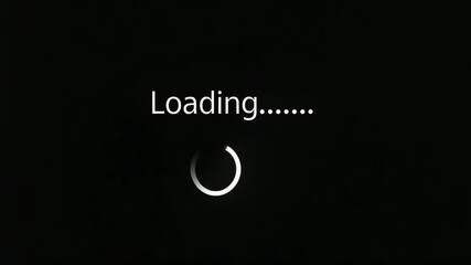 Loading screen with spinning circle icon black background showing progress and anticipation with white text and circular progress icon symbolizing - Powered by Adobe