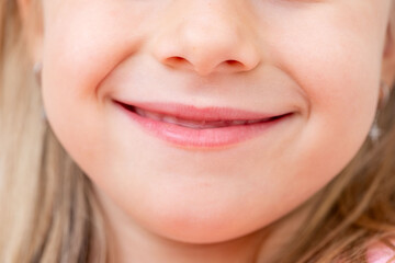 Close-up portrait five year old preschool girl with gentle smile, Childhood happiness, innocent and...