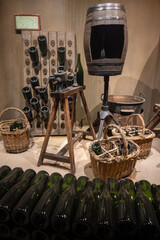 Disgorgement process with champagne bottles in caves, traditional method of production of cremant, blanquette sparkling wine Limoux, Occitania, France