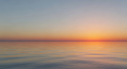 Obraz premium Calm ocean reflecting sunset hues of orange, pink, and grey, creating a serene and peaceful atmosphere, ideal for tranquility and nature themes