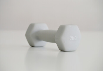 Gray 2kg Dumbbell on Flat Background 