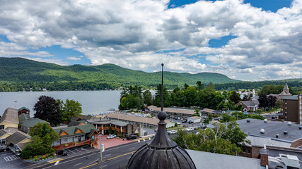 July 21, 2025 - Lake George, NY, USA.  Sunny afternoon summer aerial image of the south end of Lake George and Canada Street, Lake George, NY, USA.