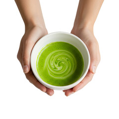 "Hands Holding Creamy Swirled Matcha Tea in Ceramic Bowl"