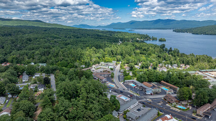 July 21, 2025 - Lake George, NY, USA.  Sunny afternoon summer aerial image of the south end of Lake George and Canada Street, Lake George, NY, USA.