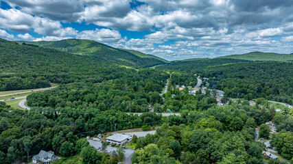 July 21, 2025 - Lake George, NY, USA.  Sunny afternoon summer aerial image of the south end of Lake George, looking north, Lake George, NY, USA.