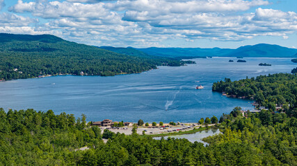 July 22, 2025 - Lake George, NY, USA.  Sunny afternoon summer aerial image of the south end of Lake George, looking north, Lake George, NY, USA.