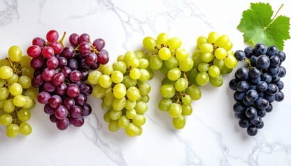 Closeup Still Life of Colorful Grapes on Marble Surface jpg