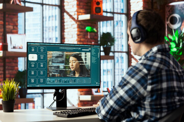 Man in home office listening music, uses app converting text prompts into videos. Person wearing headphones getting assistance from AI tech generative models using GPT text analysis function