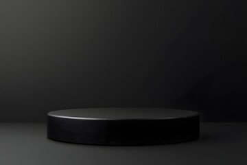 "Pure black podium on matching background creates infinite shadowless stage - high-res minimalist mockup for premium product displays."

