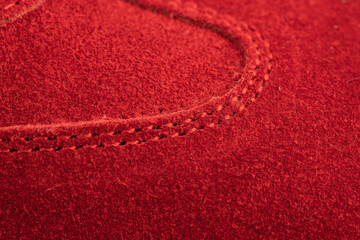 red suede sports-style winter boots, isolated on a white background
