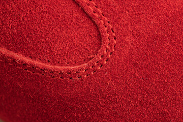 red suede sports-style winter boots, isolated on a white background
