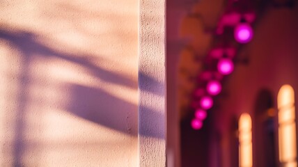 Soft pink wall with purple shadow patterns and blurred neon lights background abstract