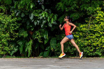 Young woman running in Panama city - stock photo