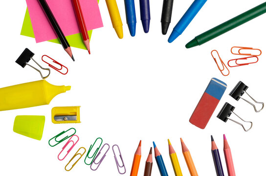 Colorful school and office supplies arranged in a circle on transparent background with central copy space for design. 