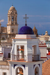 Rooftops and historic towers in Cadiz, Spain on a sunny day